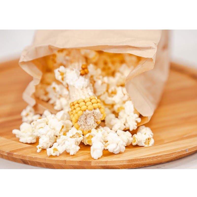 Popcorn and Cob out of the included paper bag after popping